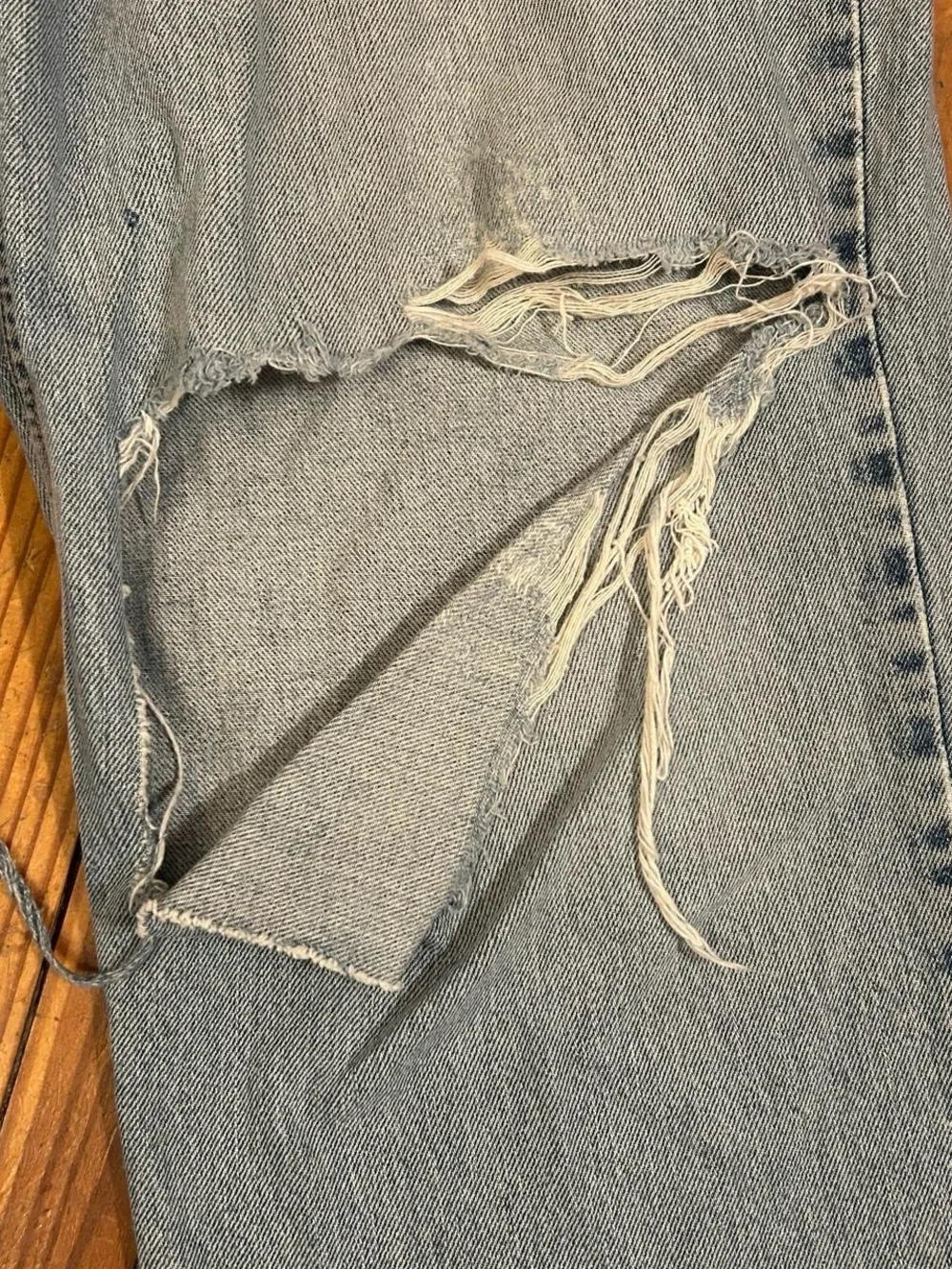 Vintage Levi's Light Blue Distressed Thrashed Relaxed Fit Jeans
